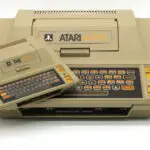 ATARI 400 Mini Retro Console with CXStick controller and built-in games.